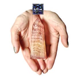 HerMJ - Pink Fluorite Tower Held In Hands. HerMJ gemstone Decor collection.