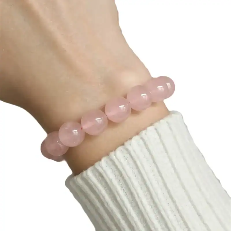 Pink Rose Quartz Bracelet – HerMJ Elegant pink rose quartz gemstone bracelet for women, perfect for jewelry lovers and gemstone enthusiasts. Handcrafted with high-quality beads, ideal for healing and fashion.