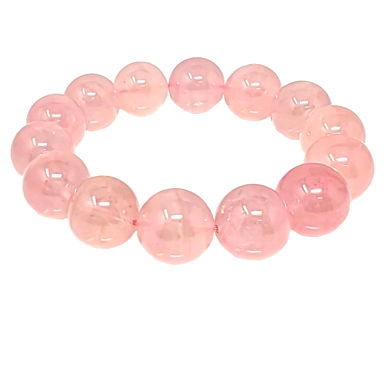 Pink rose quartz bracelet for healing and love. Handcrafted jewelry featuring smooth, polished beads perfect for spiritual wellness and stylish accessories.
