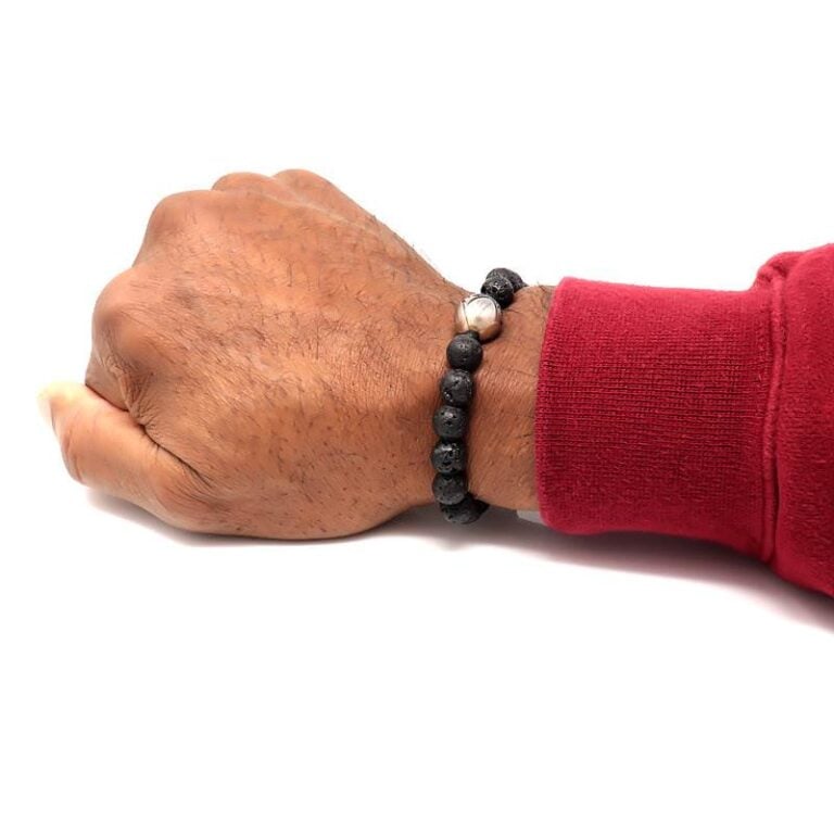 Capturing the lava stone meaning in a Black Lava Stone and Tahitian Pearl Bracelet