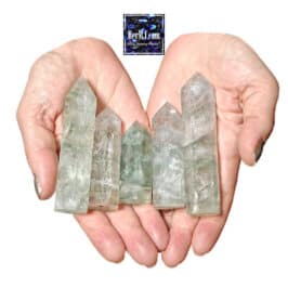 Green Fluorite Towers Held in Hands. Gemstone decoration stones, raw mineral decor, HerMJ gemstone jewelry collection, unique crystal decor accessories for wellness and elegance.