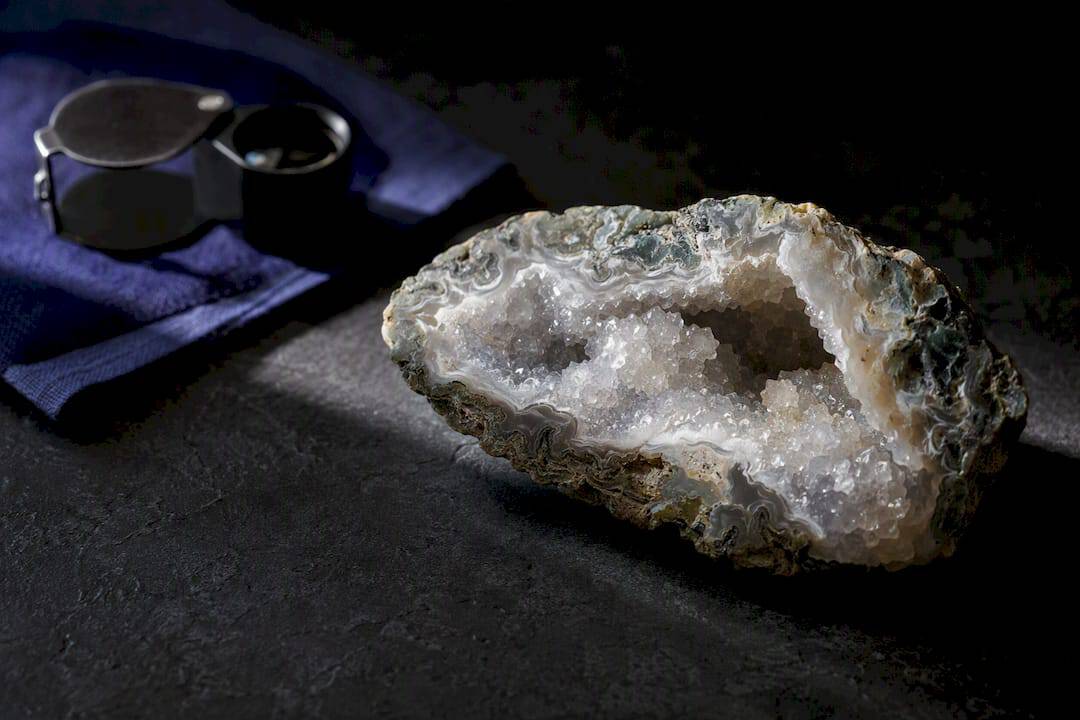 Druzy for Jewelry Buyers: Identify Real Pieces, Protect Their Sparkle Druzy mineral slice with sparkling crystal surface