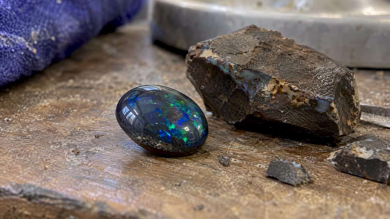 Black Gemstones, Mohs Wearability and Care Black opal showing blue and green color flashes